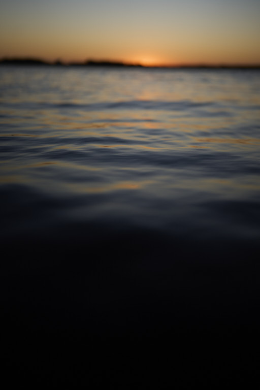 sunset colors reflected in the water